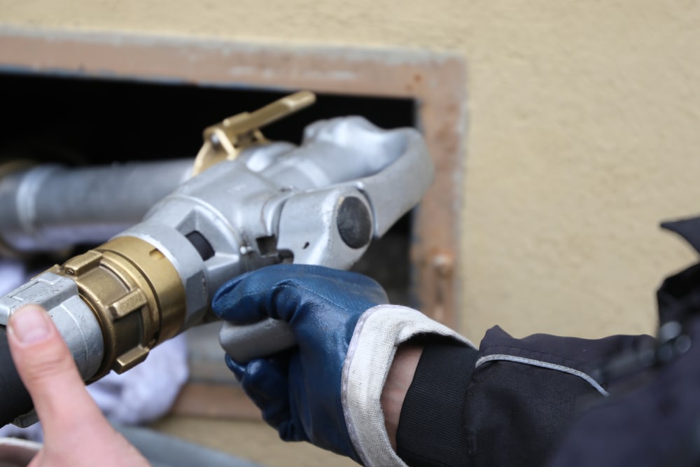 Close,Up,Of,A,Truck,Delivering,Straight,Heating,Oil